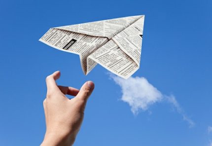 Newsletter concept - newspaper plane